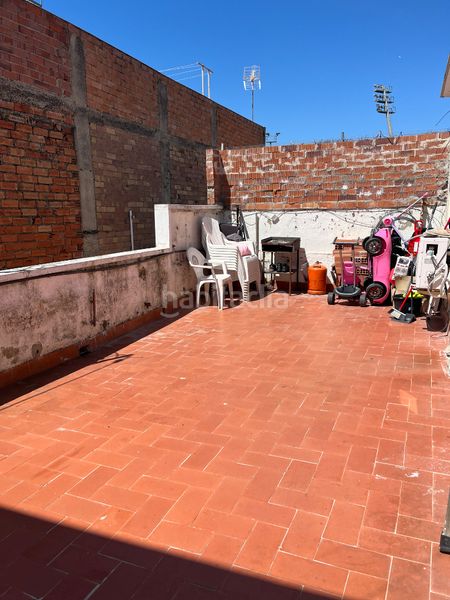 Foto b88ab970-5c30-4c28-b72e-5a11f5befe0f. Casa aparellada a Ponent Reus