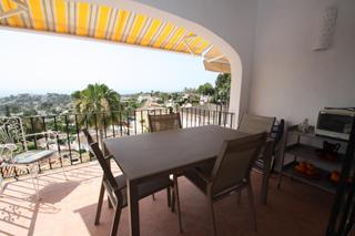 Casa en Benimeit-Tabaira. Encantador bungalow con vista al mar y piscina comunitaria en te