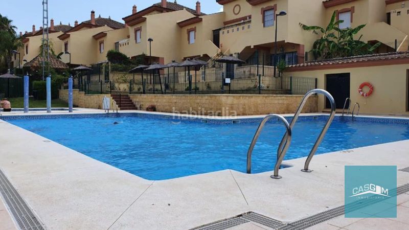Foto 1cdc80df-3988-48e8-ac69-5c16a751eb20. Rent semi detached house with fireplace parking pool in Islantilla