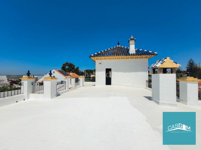 Foto 91ace2bc-9f6c-421f-9ca4-e977a1efbcdc. Xalet amb xemeneia aparcament a El Conquero Huelva