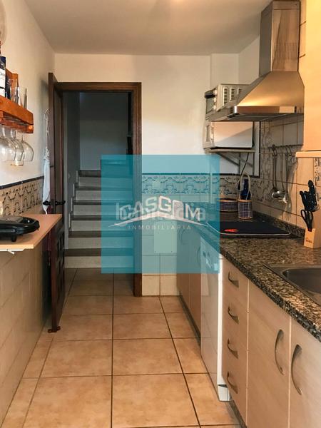 Foto 52c65f60-528a-4d88-8b0b-f0e3c0c5bc24. Maison jumelée avec parking piscine dans Islantilla golf Islantilla