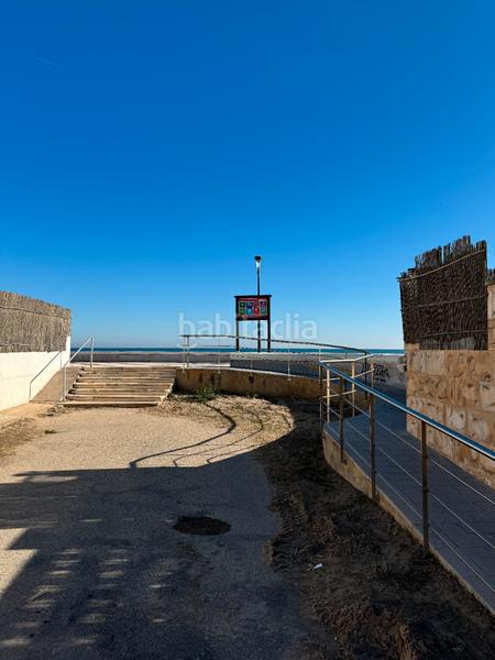 Foto 2e6666a1-f3b9-4f5d-804d-ec29e0499bc0. Chalet in carrer de la cala de calp 10 in Les Palmeres Sueca