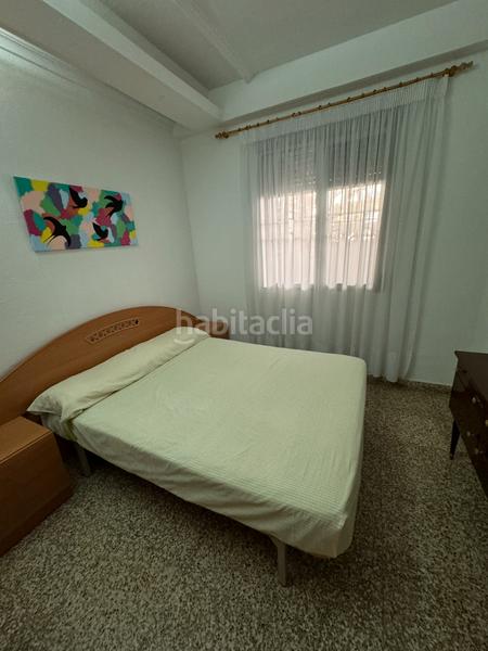 Foto b21229c0-c0b3-431e-b62e-c91fcbc81342. Chalet in carrer de la cala de calp 10 in Les Palmeres Sueca
