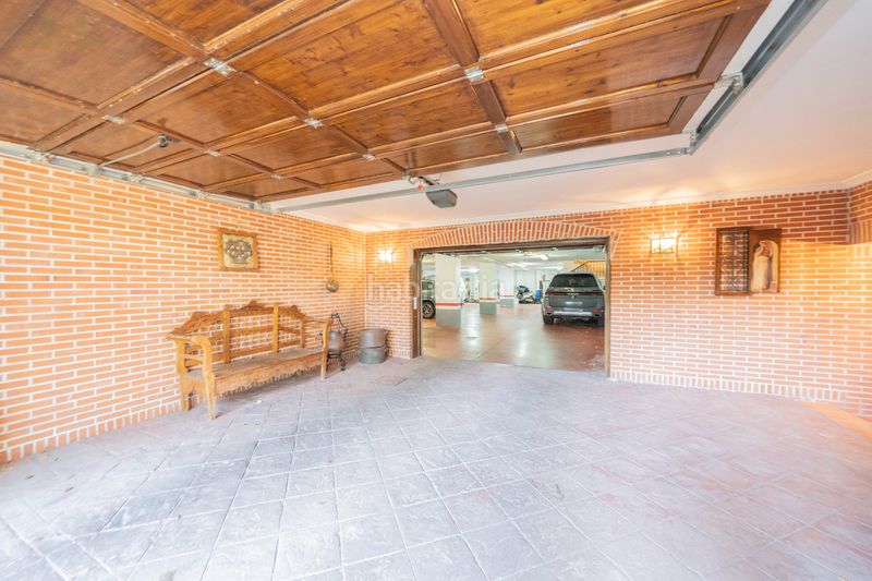 Foto ea40ed66-4674-4953-9e00-186885351f88. Chalet con camino riscaldamento parcheggio piscina in Pozuelo de Alarcón