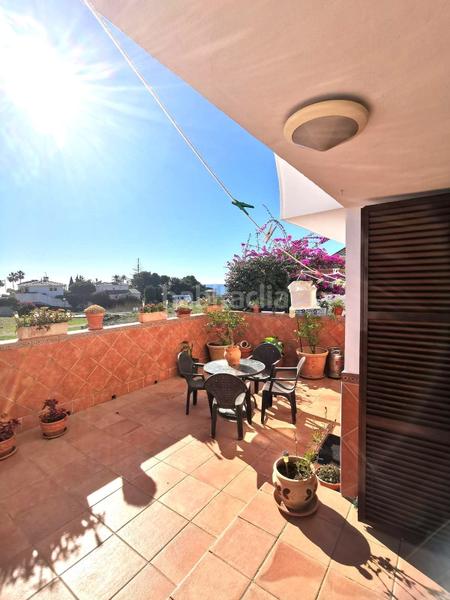 Foto 5fad1556-c3ec-4077-b98f-7e50a0864002. Casa  adosada en la cala con vistas al mar. en Mijas