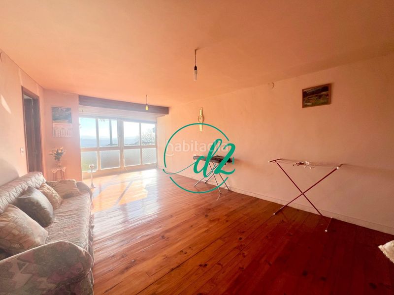 Foto f5077100-c81e-4fcc-a29f-4ac1c533dce3. Casa aparellada amb aparcament a Maceda