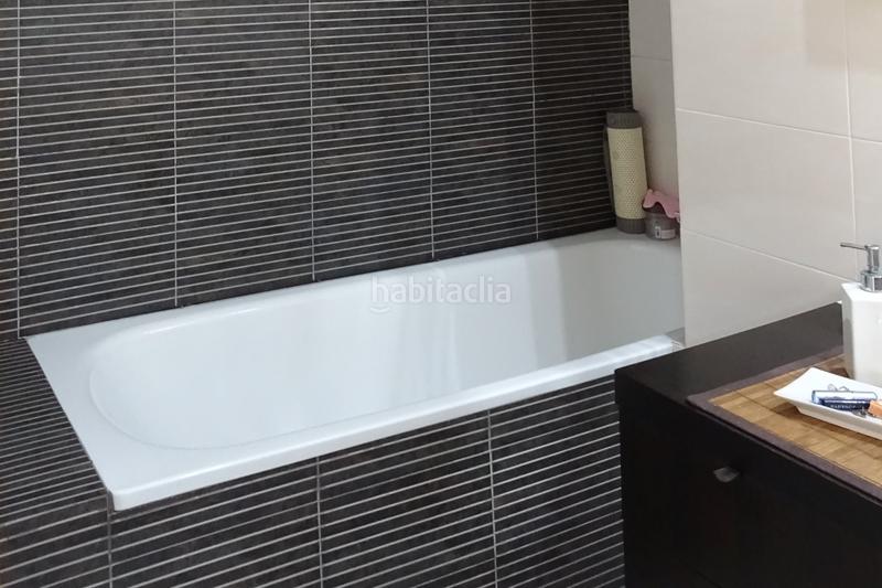 Foto 03cb71c4-22dd-402c-896d-3f7324dea111. Casa aparellada amb calefacció aparcament piscina a Sant Quirze del Vallès