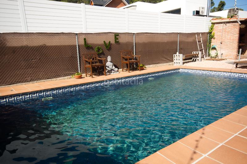 Foto 1fb5ff5b-faf4-4460-941f-a3955599196f. Casa aparellada amb calefacció aparcament piscina a Sant Quirze del Vallès