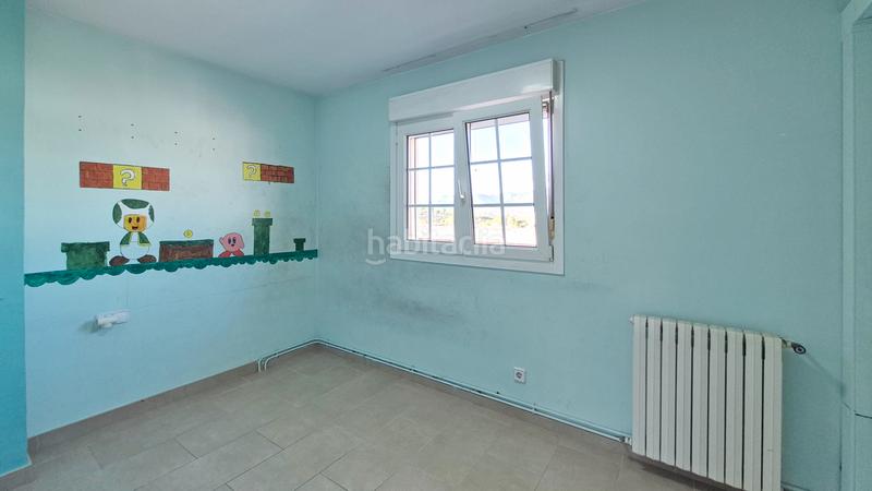 Foto b6d8bf53-cdbd-4d70-b2fd-9643a9a08dc0. Reihenhaus mit parking in Abrera