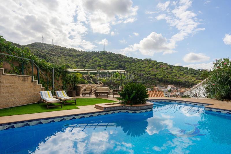 Foto a434a803-28b0-4017-bc69-8cc780bbf400. Chalet mit heizung parking pool in Sant Fost de Campsentelles