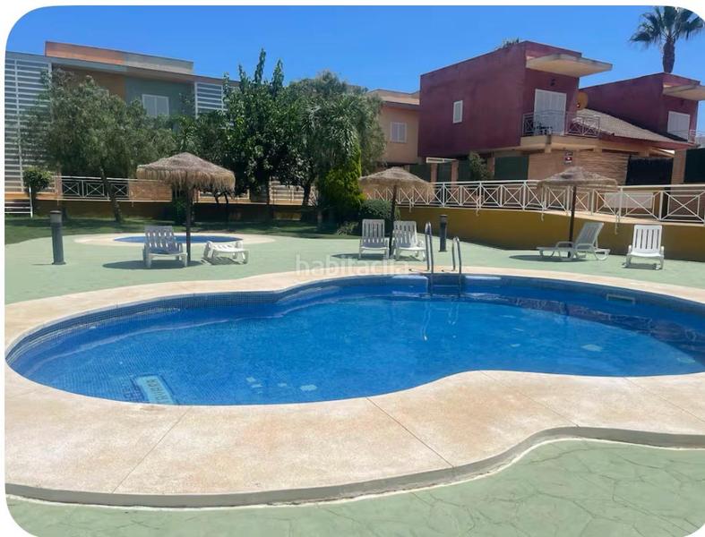 Foto d2babea2-62b7-4f7b-9cbd-0fb0af42b824. Maison jumelée avec parking piscine dans Isla Canela Ayamonte
