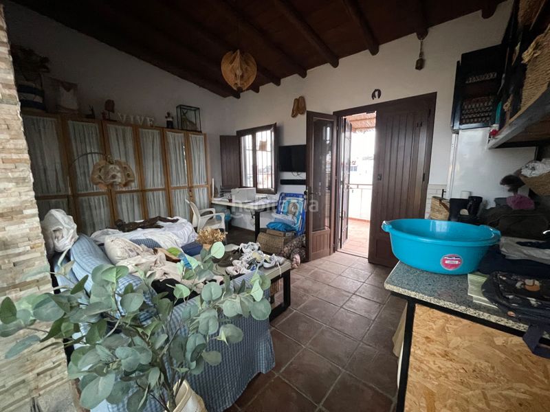 Foto 884b65a4-2bd1-4164-865d-41d232e7e47c. Casa adossada amb xemeneia calefacció aparcament piscina a Coria del Río
