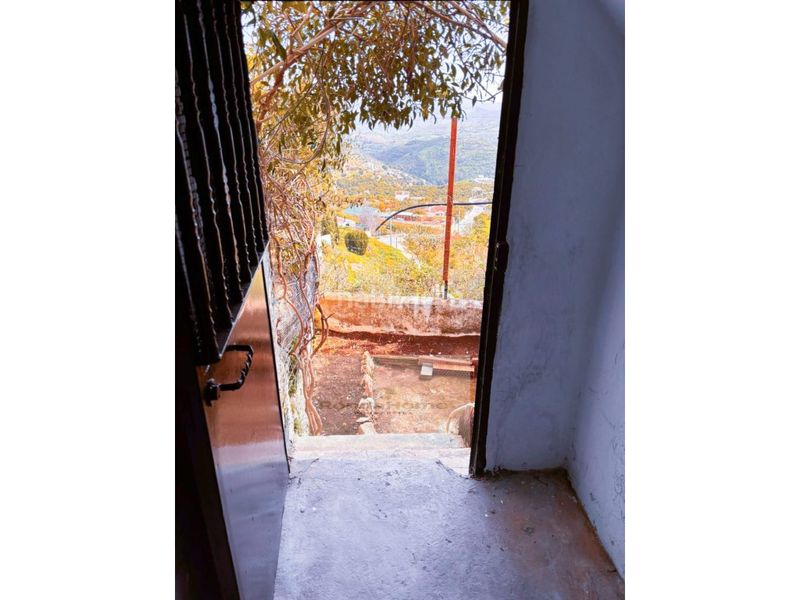 Foto 05de3dfc-c868-4414-bf7c-a5df55d98d3c. Casa amb aparcament a Yunquera