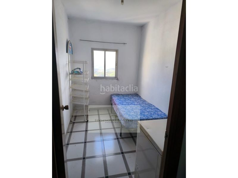 Foto 79f22b08-3e60-4cd6-aa9d-14bb5bff3385. Casa amb aparcament a Yunquera