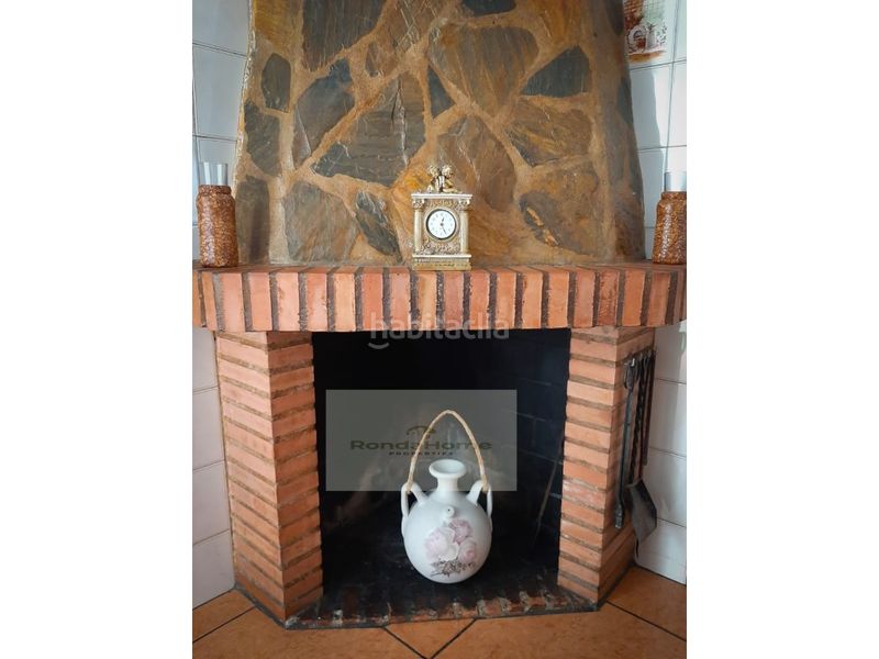 Foto 9b450bfc-d762-4dff-a260-13369d8e52a5. Casa amb aparcament a Yunquera
