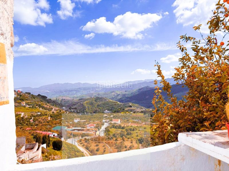 Foto cba1f786-e195-4abd-a820-77793f85d31d. Casa amb aparcament a Yunquera