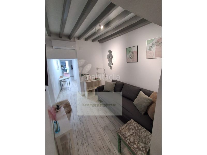 Foto b8680d23-9f94-4d3e-854a-d9b6372dc357. Casa amb aparcament a Álora