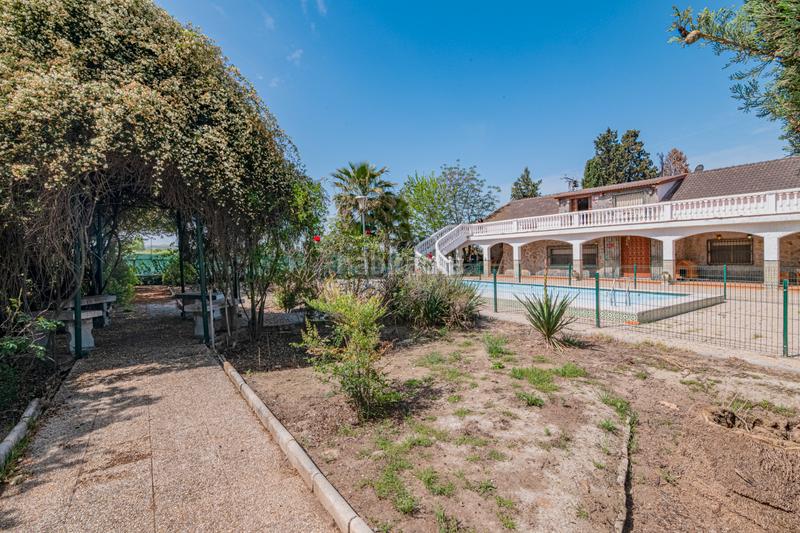 Foto e7190c8c-8884-45e4-830f-1c1d611da11a. Casa en camino de Santa Fe 139 villa unica de 3000 m de parcela con casa de 360m, piscina propia, al lado del aeropuerto de granada en Santa Fe