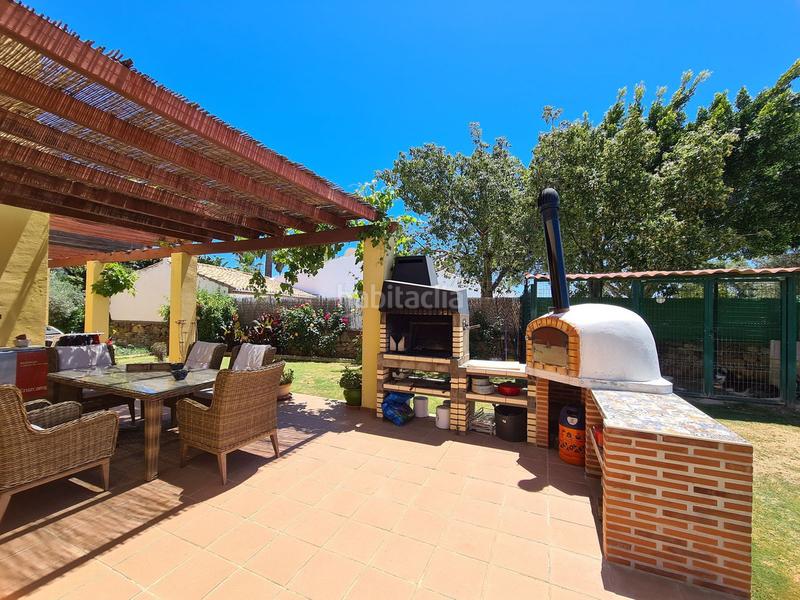 Foto 0c69bdc4-5733-4fee-9fb3-a261cca6d981. Casa villa de 3 dormitorios en primera linea de golf con jardin y piscina privada en Manilva