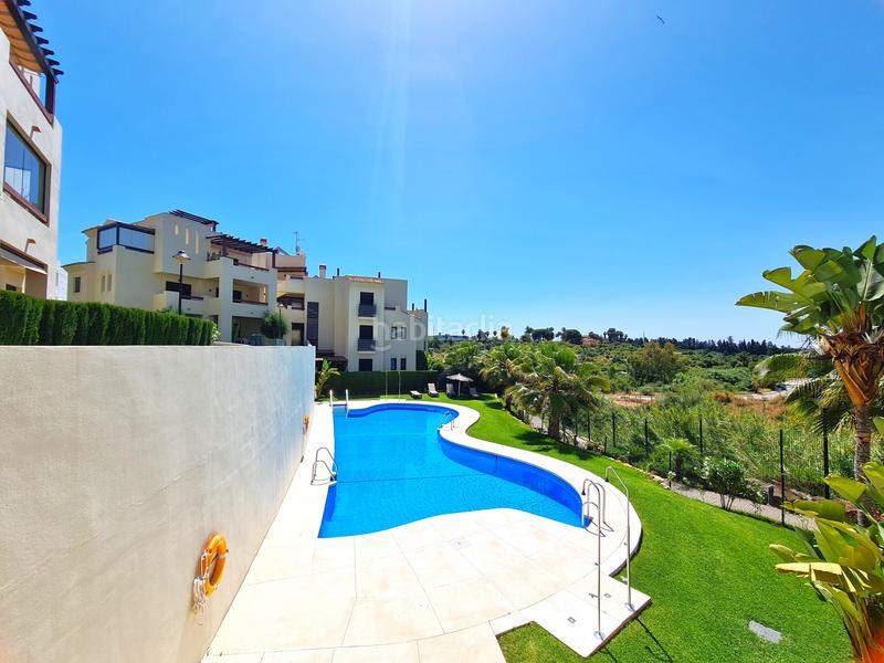 Foto 522e4360-31be-4d71-987f-3c5a609365b2. Apartamento magnifico apartamento en esquina de 3 dormitorios con gran jardín en Estepona