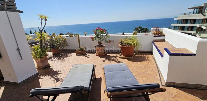 Foto 5a06416c-f03d-4455-8878-2c699f870716. Ático exclusiva vivienda con vistas al mar en primera línea de playa terraza de ensueño y acceso directo al paseo marítimo en Estepona