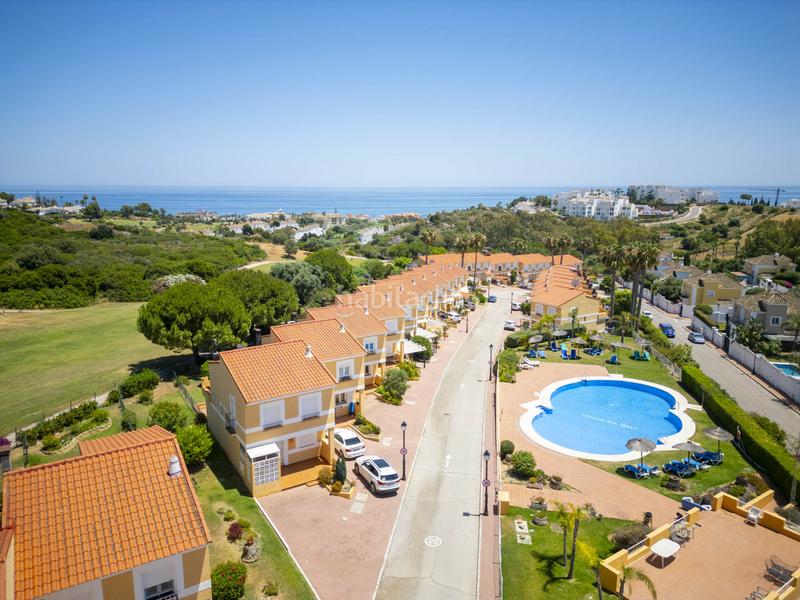 Foto 48f7dac0-ef67-4f4b-bcaf-4db428310a43. Casa a schiera con parcheggio piscina in La Duquesa Manilva