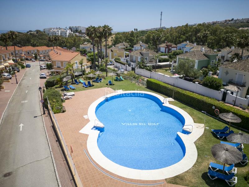 Foto cd51113c-b97f-4812-ac8a-ec1d10365896. Casa a schiera con parcheggio piscina in La Duquesa Manilva