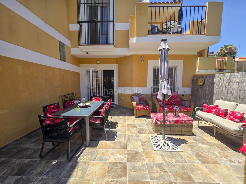 Foto a6d40ccb-f1e6-49f8-871d-74af7472057b. Casa adosada en La Duquesa Manilva