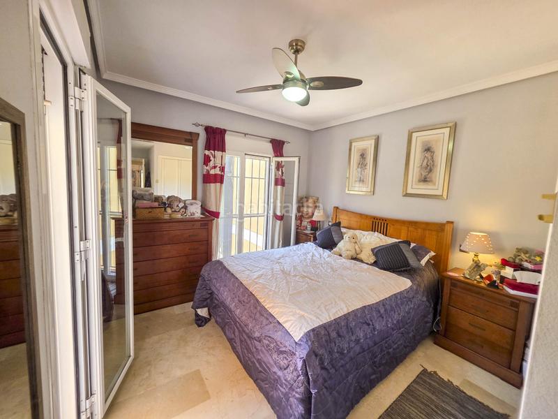 Foto 030f5a65-6af8-4f25-8ab4-d68de4e47c2c. Semi detached house with parking pool in La Duquesa Manilva