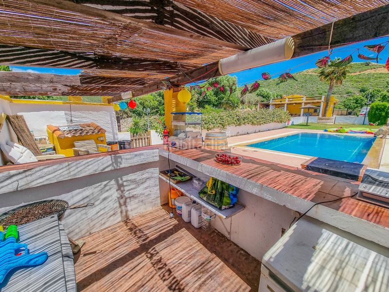 Foto 2ede6f4a-4048-466d-a5cc-db1a7fa55984. Casa amb aparcament piscina a Casares pueblo Casares