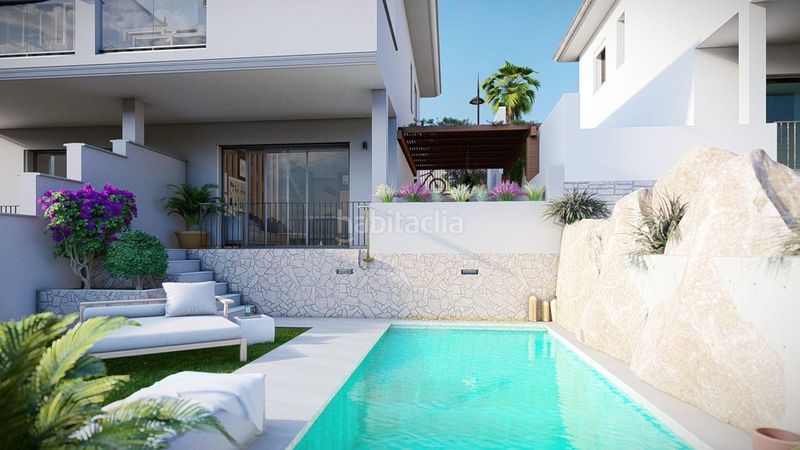 Foto 05df520d-8b0e-44be-8a2c-41c0ed417874. Casa aparellada amb piscina a Chullera Manilva