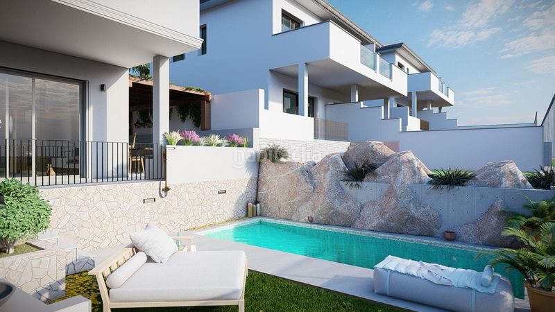 Foto cea2dd45-478e-425a-bd81-6a99c8729a12. Casa aparellada amb piscina a Chullera Manilva
