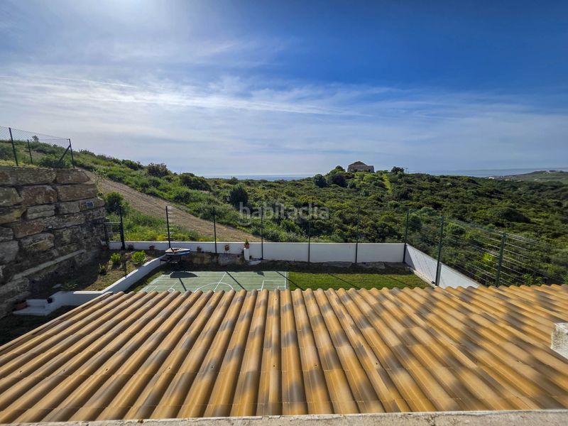 Foto da5cad29-8f65-45e0-a7ba-20f3a78161c0. Casa aparellada amb aparcament piscina a bahía de Casares Casares