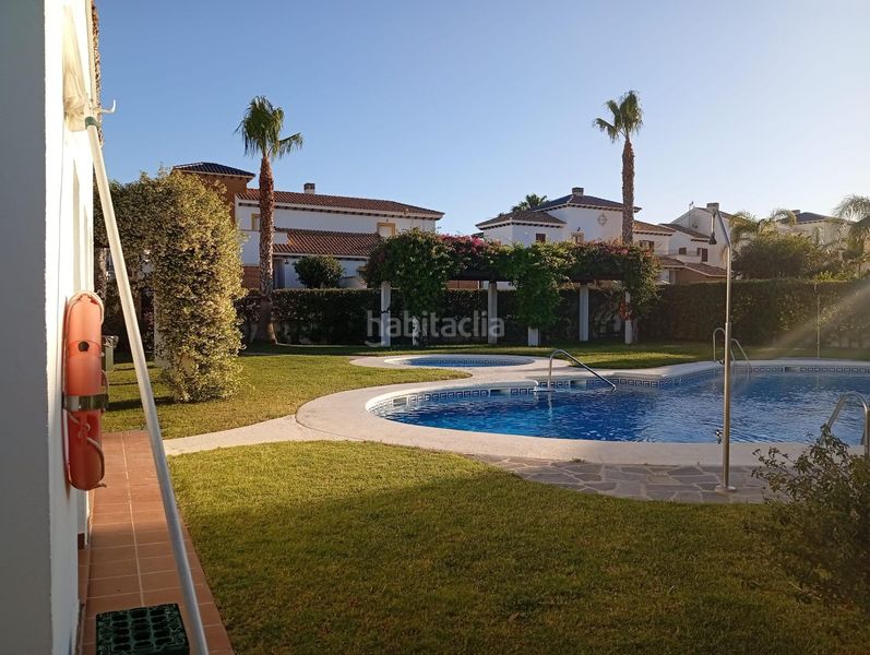 Foto 78047c82-b0b5-42ba-a4fc-42a71eb19288. Casa adossada amb aparcament piscina a Lomas del Mar Vera