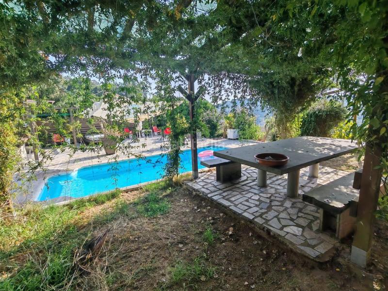 Foto 9f323bef-67cf-4391-8f47-fc716783e566. Chalet  independiente con piscina en Mos