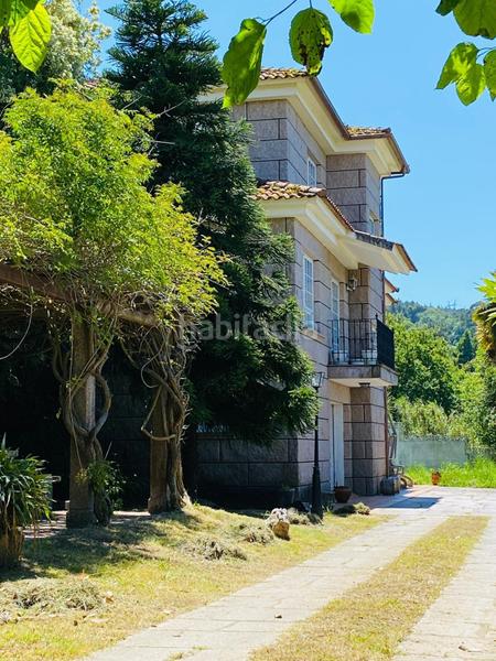 Foto 56d39329-ee37-4432-9f64-030ef3c9d984. Casa chalet con jardín y piscina en Redondela