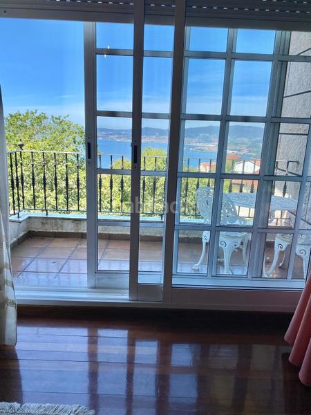Foto d616198f-0774-4b98-beb1-9572e94484d7. Casa chalet con jardín y piscina en Redondela