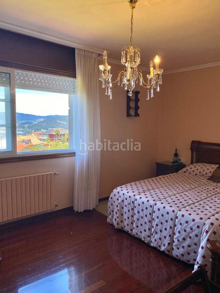 Foto fb61067c-229a-4a05-961a-2f585bf75bd2. Casa chalet con jardín y piscina en Redondela