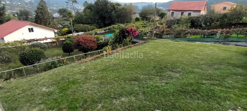 Foto 1726a968-a214-4245-aa64-480c4023ec6a. Casa amb aparcament a Redondela