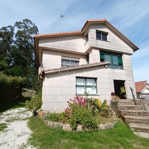 Foto a894bac9-a5f2-49d0-a2c2-b04c98052f00. Casa amb aparcament a Redondela