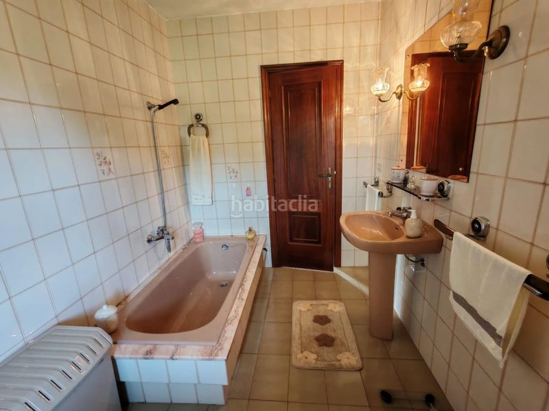Foto 413f7dc0-16a9-43bd-877e-498c5be0db55. Casa amb calefacció aparcament a Valadares - Beade Vigo