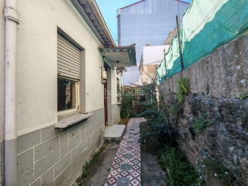 Foto a8cd7c86-5bbe-41ad-af15-a75e20e46931. Casa amb aparcament a Lavadores Vigo