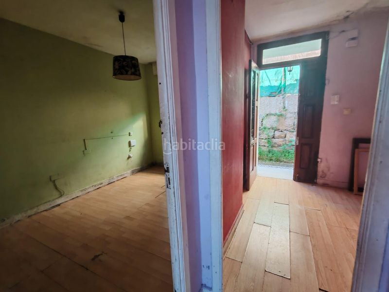 Foto fafdebf3-d288-4ec1-a2ea-dc13d0ce4dfd. Casa amb aparcament a Lavadores Vigo