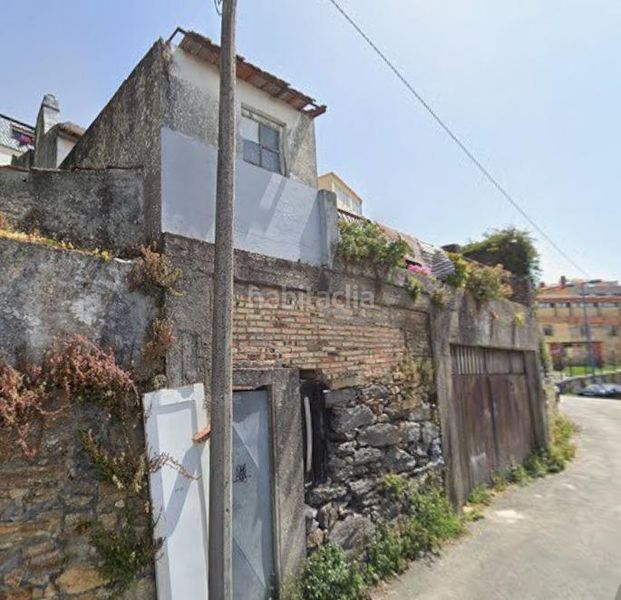 Foto fc9ba5da-73f6-480c-9d6d-0df73280b468. Casa amb aparcament a Lavadores Vigo