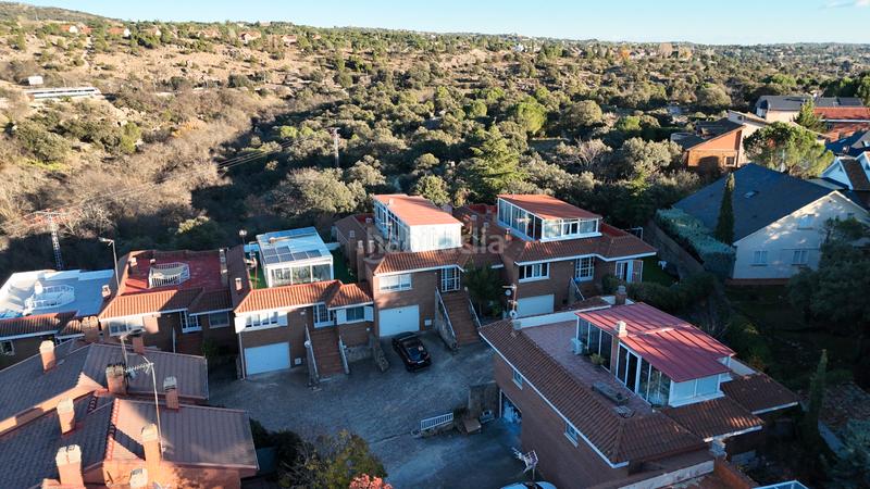 Foto 9259bf78-fb19-402a-8235-c125927e89bd. Reihenhaus mit heizung pool in La Navata Galapagar