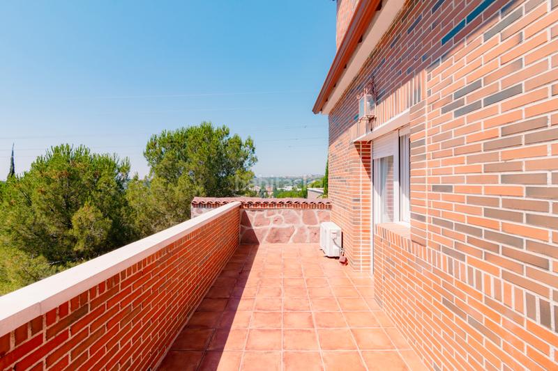 Foto 0686d489-fd0f-4ba9-8502-250c6eaf4c1a. Casa amb xemeneia calefacció aparcament piscina a Torrelodones
