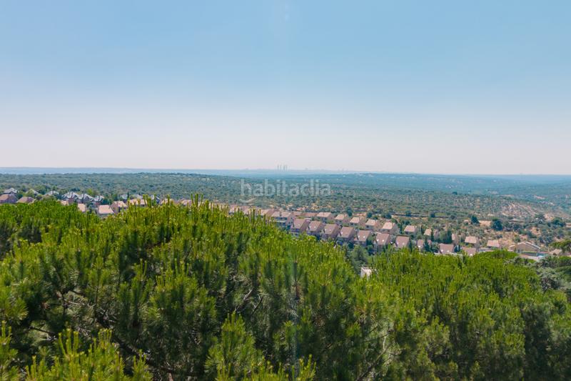 Foto 74b1a5b3-5d6d-4002-8316-f7ee1fdc717a. Casa amb xemeneia calefacció aparcament piscina a Torrelodones