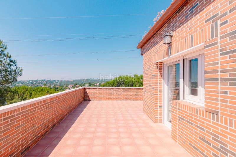 Foto a784171b-c717-405e-b213-fdca6885c32b. Casa amb xemeneia calefacció aparcament piscina a Torrelodones