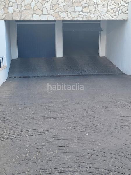 Foto 81a6d364-1e0a-45d2-8bd9-741ac1ae469a. Aparcament cotxe a calle malva 2 a Riviera del Sol Mijas
