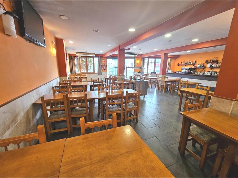 Foto 82e96b75-6ac8-42ac-a05e-836ff05ebd7c. Edificio 1 linia c35 edificio destinado a barrestaurante y hostal con 10 dormitorios en Sant Celoni